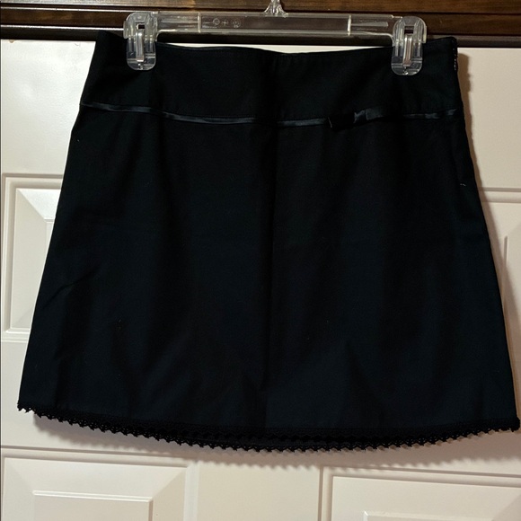 Size 0-2 The Limited Stretch Black Mini Skirt with Black Ribbon/Bow and Lace Hem - Picture 1 of 10